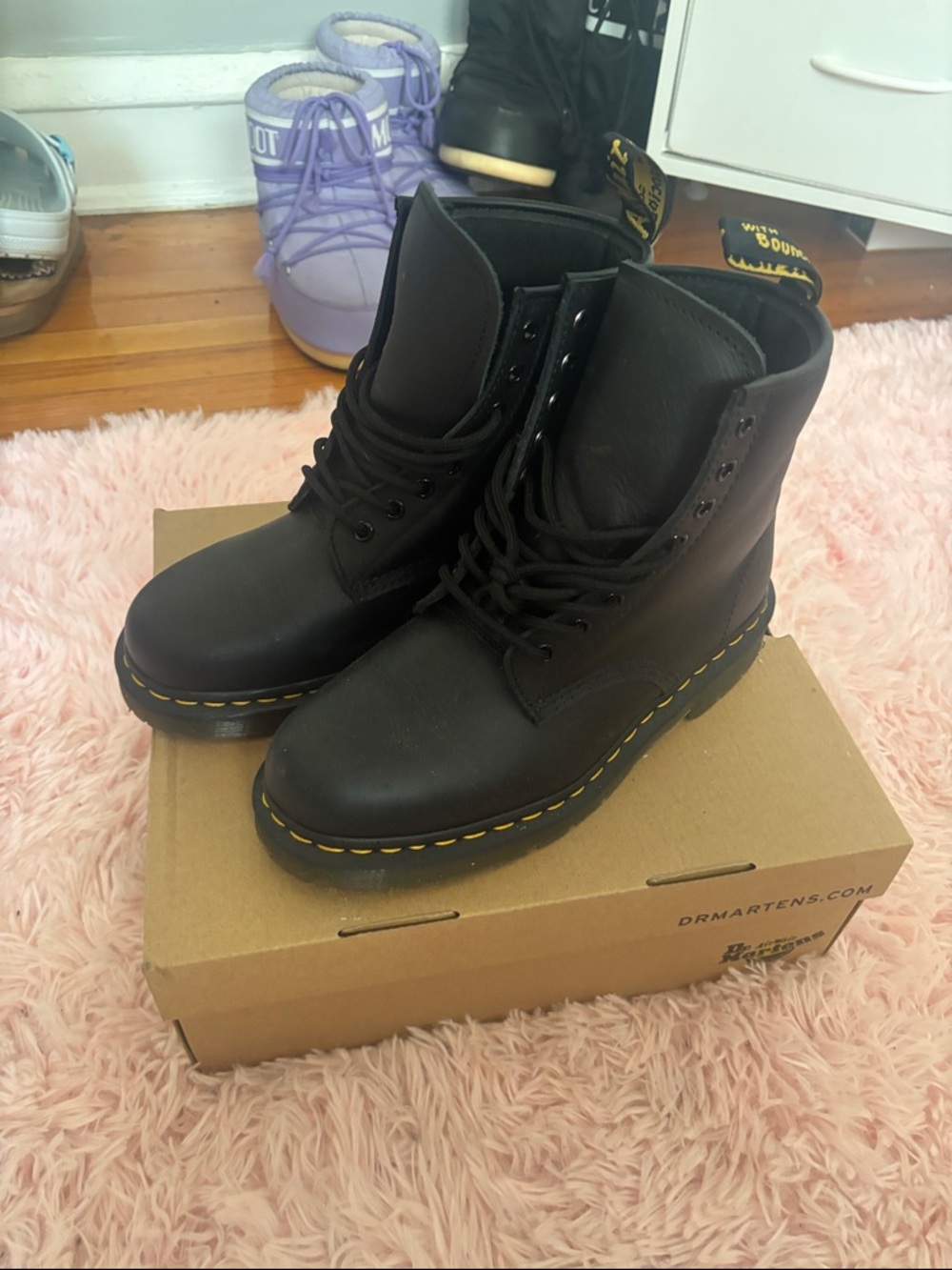 Dr. Martens Black Leather 8-Eye Lace-Up Boots with Yellow Stitching